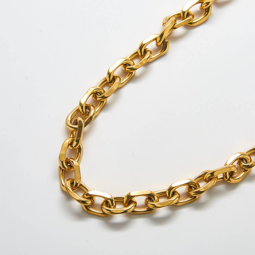 Gold chunky cable chain necklace with a bold, minimal design styled for everyday wear.