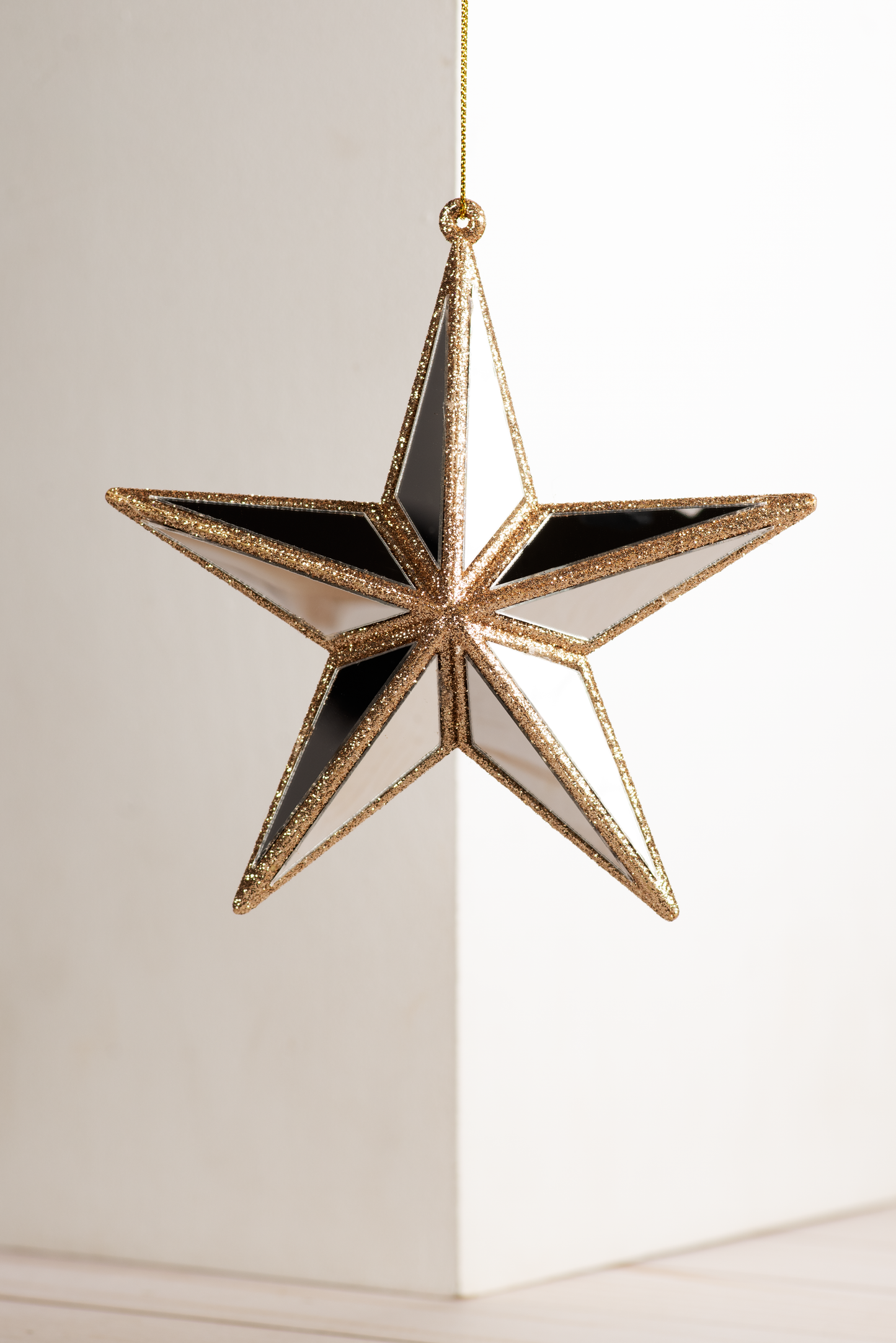 Champagne and gold mirror star ornament with glittered edges