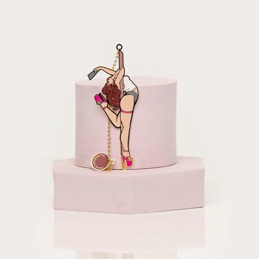 Stripper-themed bookmark with pink heels and gold chain