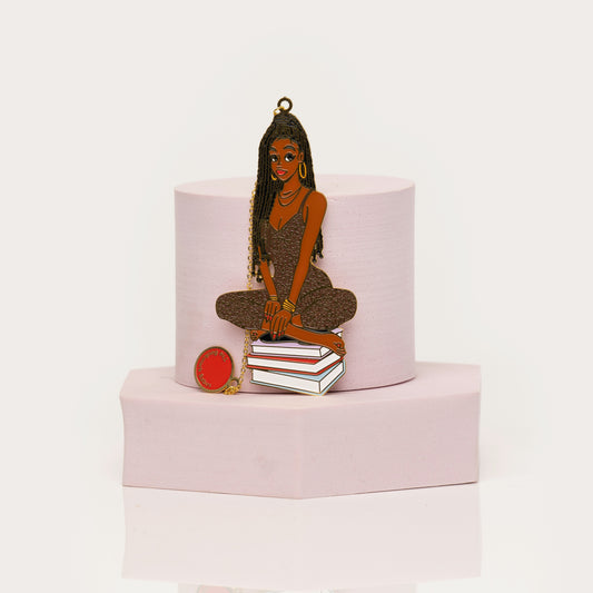 Black girl bookmark in leopard jumpsuit with gold jewelry